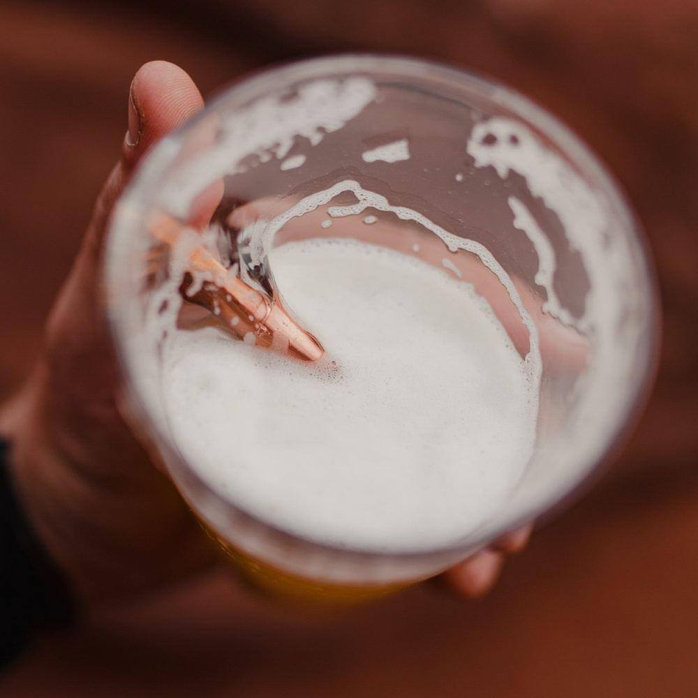 Beer Glass with a Bullet 